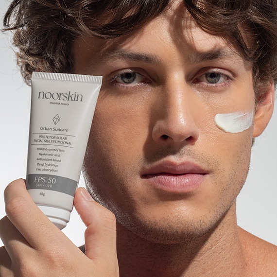 Imagem do protetor solar facial multifuncional da Noorskin, Urban Suncare, para uma rotina de cuidados com a pele.